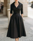 FJØRNA satin midi dress with trench collar, wrap style, waist-defining band, elegant and smooth fabric, perfect for sophisticated occasions