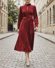 FJØRNA high-neck pinstripe midi dress with structured waist, showcasing elegant silhouette and tailored design for women.