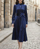 FJØRNA high-neck pinstripe midi dress for women with structured waist and elegant design, perfect for stylish occasions.