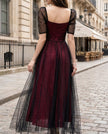 FJØRNA sheer puff-sleeve lace A-line midi dress with intricate lace details and elegant silhouette, perfect for formal occasions.