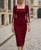 FJØRNA elegant square-neck midi cocktail dress with slit sleeves, perfect for women’s formal occasions, shown in black fabric.