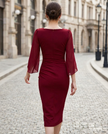FJØRNA elegant square-neck midi cocktail dress with slit sleeves, stylish and sophisticated for women, shown in the image.