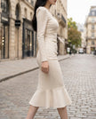 White pearl-trim square-neck mermaid midi dress for women by FJØRNA, shown on a model with fitted silhouette and elegant design.