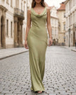 FJØRNA sleeveless draped cowl neck midi dress for women, showcasing soft fabric, elegant draping, and a stylish sleeveless design.