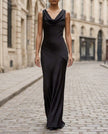 FJØRNA sleeveless draped cowl neck midi dress for women, featuring a flowy silhouette and elegant design in soft fabric.