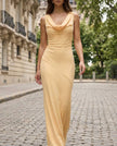 FJØRNA sleeveless draped cowl neck midi dress for women, showcasing a flowing fabric and elegant silhouette on a model.