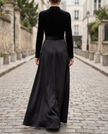 Elegant black velvet and satin midi dress for women by FJØRNA, featuring a sleek, flowing design perfect for formal occasions.
