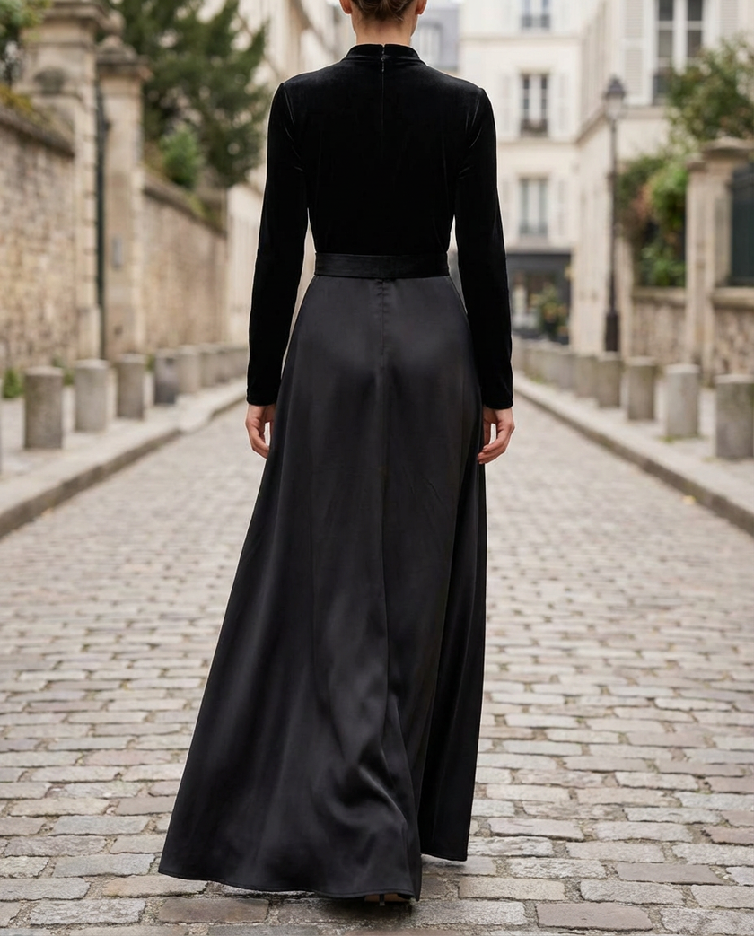 Elegant black velvet and satin midi dress for women by FJØRNA, featuring a sleek, flowing design perfect for formal occasions.