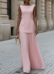 FJØRNA elegant sleeveless pleated maxi dress for women, flowing fabric with a fitted bodice and full-length skirt.