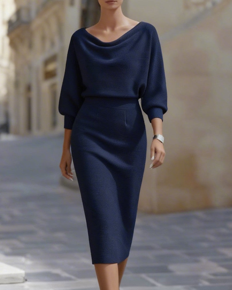 FJØRNA draped cowl neck midi dress for women with three-quarter sleeves, featuring a flowing, elegant silhouette.