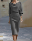 FJØRNA draped cowl neck midi dress for women with three-quarter sleeves, featuring a flowing silhouette and elegant design.
