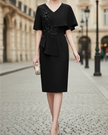 FJØRNA elegant embellished cape-overlay V-neck midi dress for women, showcasing intricate detailing and flowing fabric.