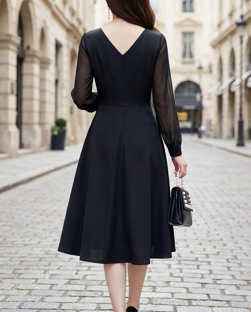 FJØRNA elegant wrap midi dress for women with sheer sleeves, featuring a sleek, sophisticated design and flowing fabric.