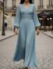 Steel blue pleated midi dress by FJØRNA, featuring a flowy design and elegant pleats, perfect for stylish occasions.