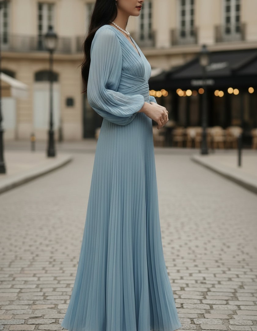 Steel blue FJØRNA pleated midi dress featuring a flowy silhouette and elegant design, perfect for stylish occasions.