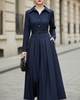 FJØRNA collared button-front midi dress with tailored pleats and belted waist, featuring a classic, elegant silhouette for women
