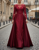 FJØRNA burgundy lace long-sleeve satin A-line gown with a flowing maxi dress design, featuring elegant lace details and a fitted bodice.
