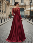 FJØRNA burgundy lace long-sleeve satin A-line maxi dress with elegant design and flowing silhouette.