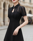 FJØRNA sheer panel collared keyhole A-line mini dress, perfect for weddings, featuring a stylish design and elegant silhouette.