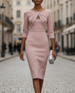 FJØRNA twist-front keyhole long sleeve midi dress for women, featuring a fitted silhouette and elegant design.