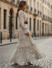 FJØRNA romantic floral chiffon maxi dress with belted waist, featuring a flowy silhouette and vibrant floral pattern.
