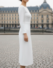 FJØRNA elegant boat-neck long sleeve midi dress for women, showcasing a stylish, fitted design with a sleek silhouette.