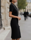 FJØRNA blazer-style deep V midi dress with embellished trim, featuring a tailored blazer design and elegant midi length.
