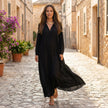 FJØRNA loose fit maxi shirt dress with long sleeves and V-neck, featuring a relaxed silhouette and lightweight fabric.