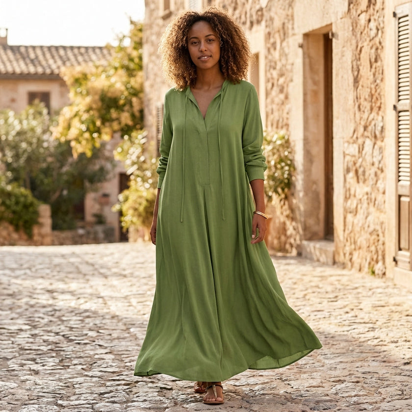 FJØRNA loose fit maxi shirt dress with long sleeves and V-neck, showcasing soft fabric and relaxed silhouette.