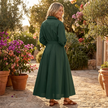 FJØRNA button front maxi shirt dress with waist tie, long sleeves, and a relaxed fit, shown in a natural fabric with a collar.