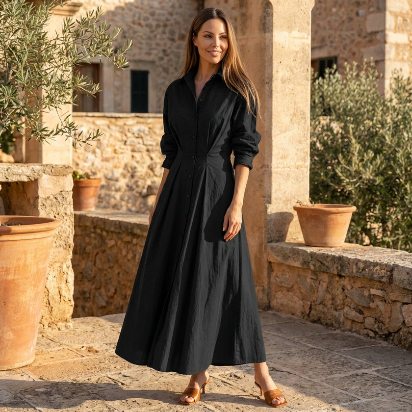 FJØRNA button front maxi shirt dress with waist tie, long sleeves, and a relaxed fit, displayed on a hanger against a neutral background.