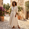 FJØRNA button front maxi shirt dress with waist tie, long sleeves, and a relaxed fit, shown on a model.