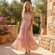 FJØRNA tiered lace maxi dress with V-neck and flowing skirt, elegant and feminine evening dress for special occasions.