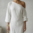 FJØRNA women's summer maxi dress with asymmetric linen design, flowy fabric, and sleeveless style perfect for warm weather.