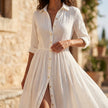 FJØRNA women's summer dress with long sleeves and a slit, lightweight fabric, and a flowy design perfect for warm weather.