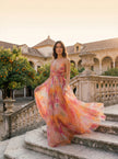 FJØRNA elegant floral maxi dress for women with a V-neck, flowing fabric, and feminine design, suitable for casual or formal occasions.