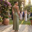 FJØRNA one-shoulder satin maxi dress with draped silhouette, featuring elegant fabric and flowing design for formal occasions.