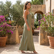 FJØRNA one shoulder satin maxi dress with draped silhouette, featuring elegant fabric and flowing design, displayed on a model.