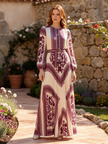 FJØRNA boho printed long sleeve maxi dress with relaxed fit, featuring colorful patterns and flowing fabric for casual wear.
