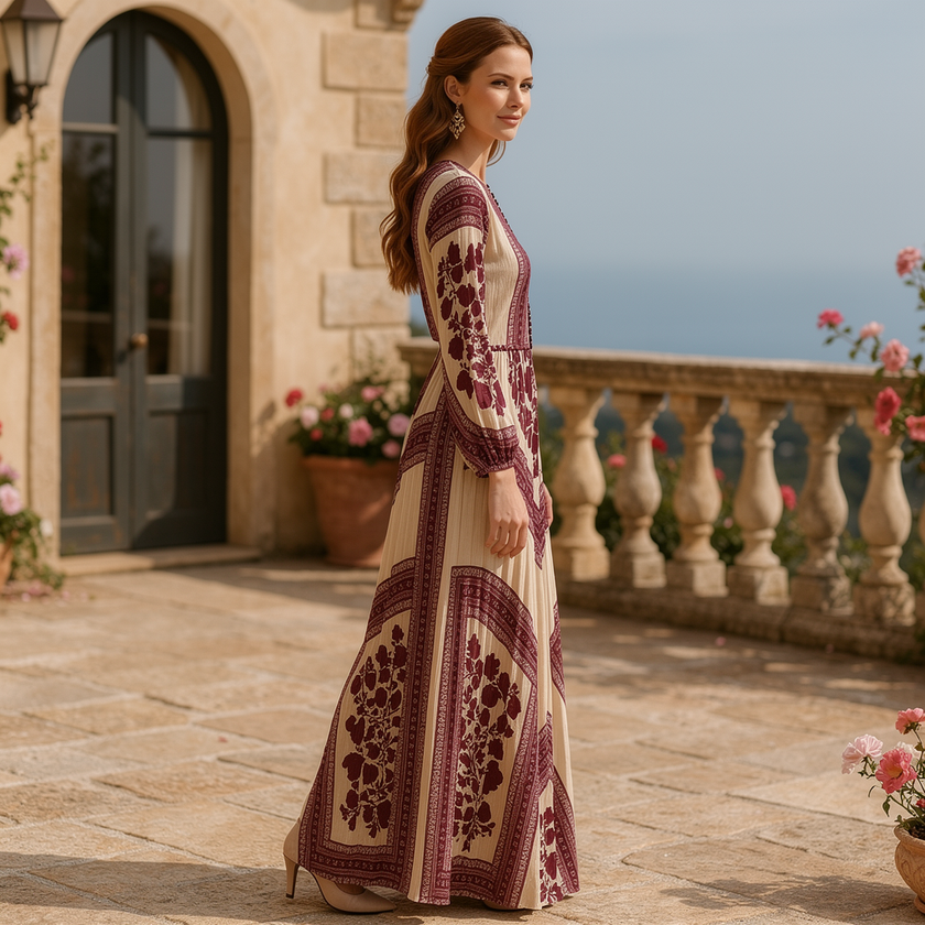 FJØRNA boho printed long sleeve maxi dress with relaxed fit, featuring vibrant patterns and flowing fabric for a stylish look.
