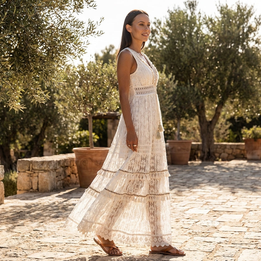 FJØRNA boho lace tiered maxi dress with V-neck, featuring intricate lace details and flowing fabric for a stylish bohemian look.