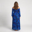 Floral flowy summer maxi dress for women by FJØRNA, featuring a lightweight, breezy design perfect for warm weather.