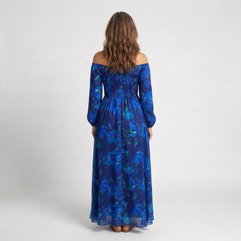 Floral flowy summer maxi dress for women by FJØRNA, featuring a lightweight, breezy design perfect for warm weather.