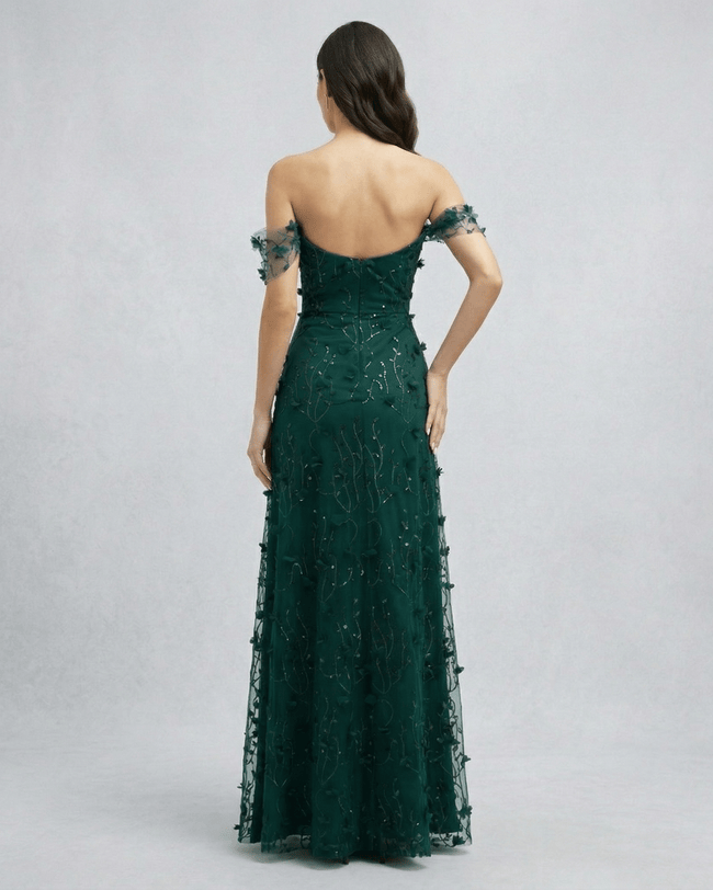 FJØRNA lace maxi dress for women, elegant long dress with intricate lace details, flowing silhouette and sleeveless design.