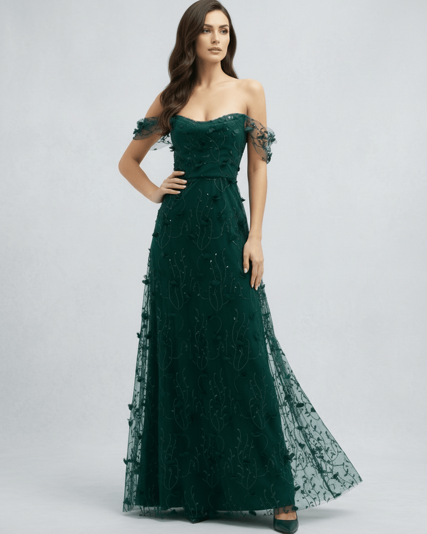 FJØRNA women's lace maxi dress featuring intricate lace details and flowing fabric, full-length fashion dress on a model.
