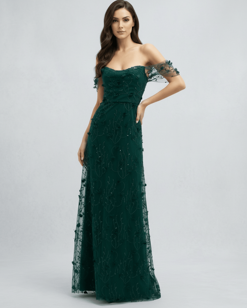 FJØRNA lace maxi dress for women showing intricate lace details and flowing silhouette on a model.