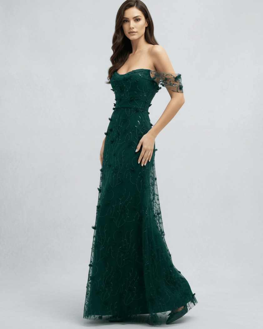 FJØRNA women's lace maxi dress featuring intricate lace details, flowing silhouette, and elegant design perfect for special occasions.