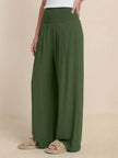 FJØRNA women's linen summer trousers with high waist and wide-leg design, featuring a drawstring for a comfortable fit.