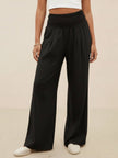 FJØRNA linen summer trousers for women with high waist, wide leg, and drawstring, made of lightweight cotton-linen fabric.