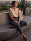 FJØRNA lightweight summer women's trousers with high waist and wide-leg design, featuring front pockets and a comfortable fit.
